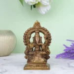 Table Top Ganesha In Brass With Hand Carved Background